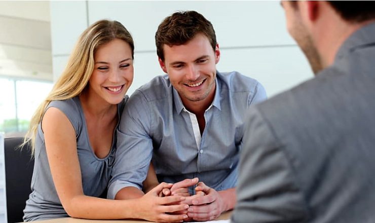 Young couple meeting financial advisor